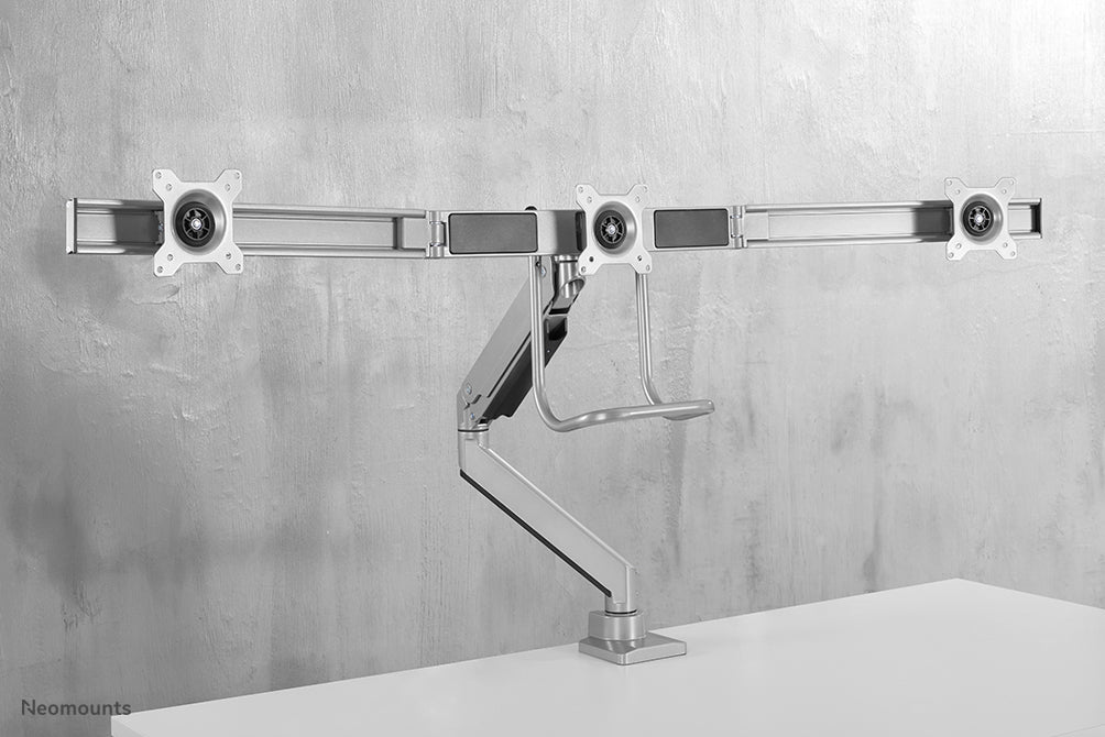 NM-D775DX3SILVER is a gas-suspended desk support with crossbar and lever for flat screens up to 27 inches (68.6 cm).
